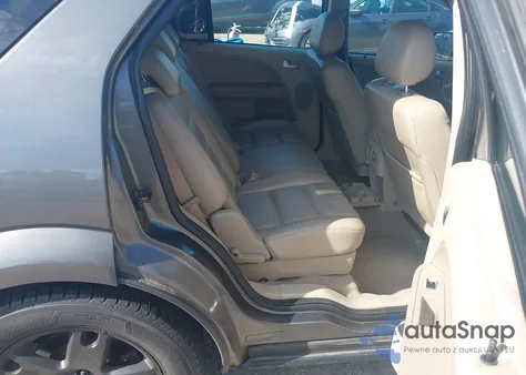 2005 Ford Freestyle Limited из США, поврежденный, VIN 1FMDK06145GA35212